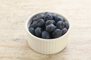 Sweet ripe blueberry heap in the bowl