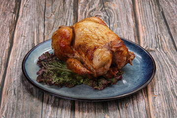 Grilled whole chicken with spices