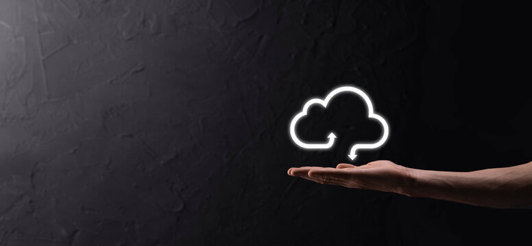 Business woman holding icon cloud computing network and icon connection data information in hand. Cloud computing and technology concept.