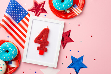 Obraz premium Fourth of July concept. Top view photo of photo frame with number 4 candle US national flag star garland plates with glazed donuts and confetti on isolated pastel pink background