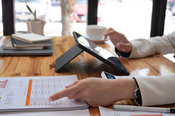 Office business woman calculating with calculator and pencil