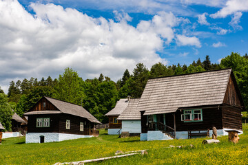 Fototapeta na wymiar Open Air Village Museum in Stara Lubovna Castle, Slovak Republic. Wooden Traditional Houses