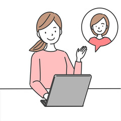 パソコンのオンラインでコミュニケーションをとる女性