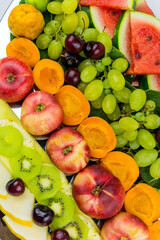 Fresh fruits. Assorted fruits colorful background. composition different sliced mix fruits assorted colorful background - Food mix cut fruits composition.