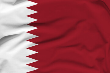 Qatar national flag, folds and hard shadows on the canvas