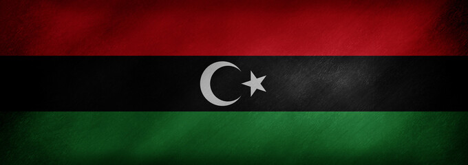 The flag of Libya on a retro background