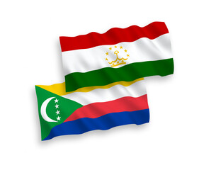 Flags of Union of the Comoros and Tajikistan on a white background