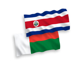 Flags of Republic of Costa Rica and Madagascar on a white background