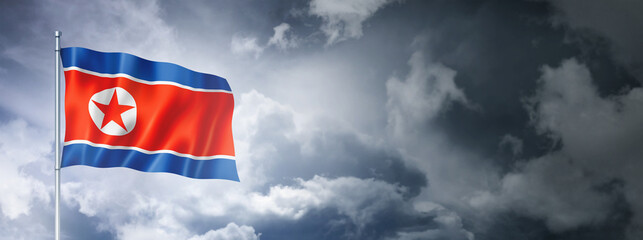 North Korean flag on a cloudy sky