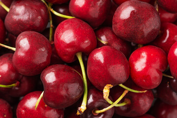 Cherry background top view. Cherry fruits, food background.