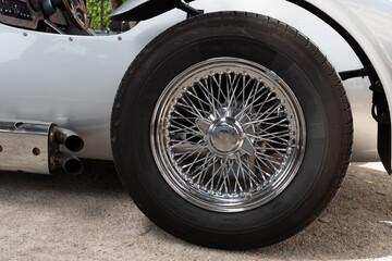 close up of antique car wheel