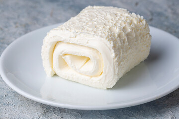 Turkish creamy dairy product. Clotted cream (butter cream) for Turkish breakfast with glass of...