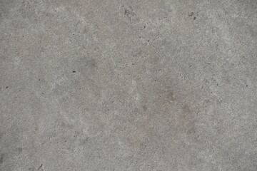 Surface of plain simple gray concrete floor from above