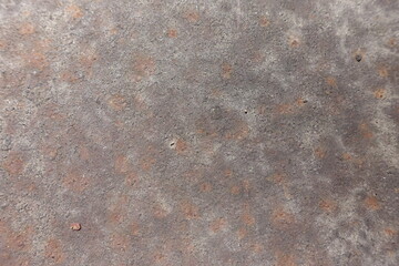 View of old, weathered and rusted metal sheet from above