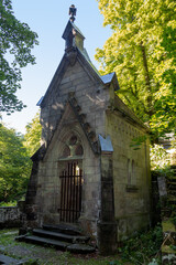 Pseudo-Gothic chapel with a tomb in the defunct cemetery.