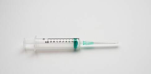 Medical syringe and needle on white background, clipping path