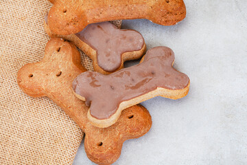 dog treats on neutral rustic background with copy space