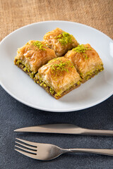 Pistachio baklava on a white plate