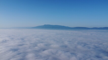 Above the fog in the morning. Above the clouds.
