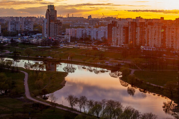 Saint Petersburg, Russia, May 7, 2022.  Multi-storey modern residential buildings in sunset time.