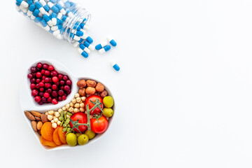 Healthy food in heart shaped dish. Healthy lifestyle and nutrition eating concept