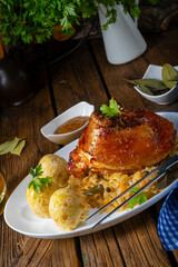 pork knuckle with sauerkraut and sweet mustard