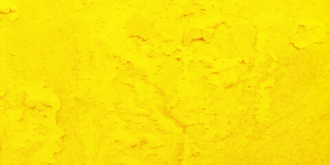 Abstract texture of yellow painted grunge concrete wall, Creative bright crumpled yellow paper texture, watercolor painting on shinny grunge decorative painted old paper texture.
