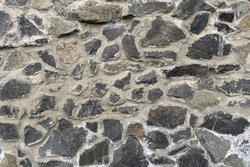 Grey stone texture, masonry made of natural stones