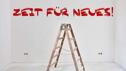 Zeit für Neues als Text an Wand nach Renovierung von Raum
