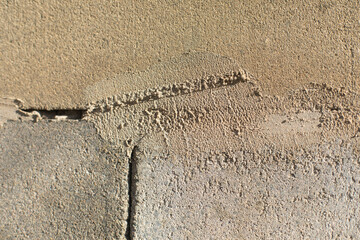 Concrete wall. Raw wall surface. Stonework.