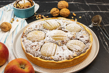 Homemade apple pie pastry on stone table. Bakery and dessert concept