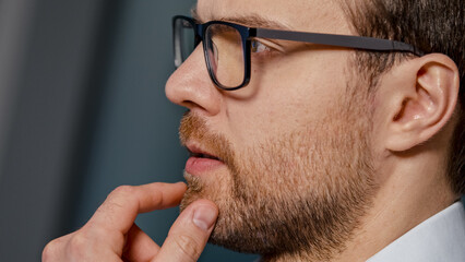 Portrait of a young businessman thinking about a new project