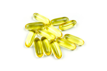 Omega 3, 6, 9 in a yellow transparent capsule (fish oil) on a white isolated background. Vitamins, food supplement. Beauty and health.