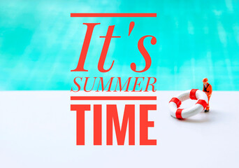 It's summer time banner with miniature worker carry life buoy over blurred blue swimming pool water...
