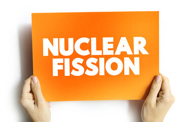 Fototapeta na wymiar Nuclear fission text quote on card, concept background