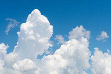 Naklejka na ściany i meble Nimbostratus clouds gather on a blue sky