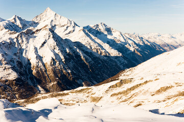 Snowy mountain during the day in winter. Zermatt, swiss alps