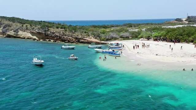 Tourists on tour of secluded tropical islet near Montecristi, Isla Cabra; drone