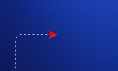 New normal concept with red paper plane in new direction on blue background.