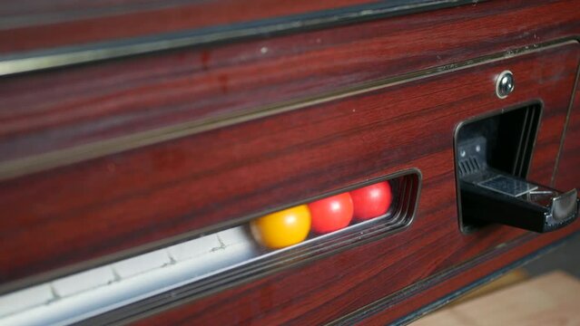 Pool balls entering a coin oporated pool table return rack system