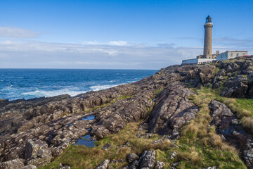 Fototapeta na wymiar At the most westerly point on the British mainland, Ardnamurchan Lighthouse has been guiding ships safely through the waters off Scotland’s west coast since 1849