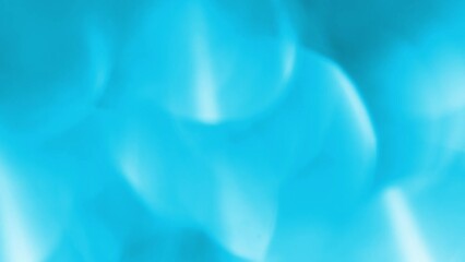 Blue bokeh abstract moving background. Large blue bokeh move, shine and shimmer with white light leaks. Light color transitions. Background, overlay or transition for compositing footages