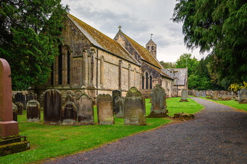 Fototapeta na wymiar St Mungo's Church in Simonburn Village, a picturesque hamlet in the Dark Skies section of the Northumberland 250, a scenic road trip though Northumberland with many places of interest along the route