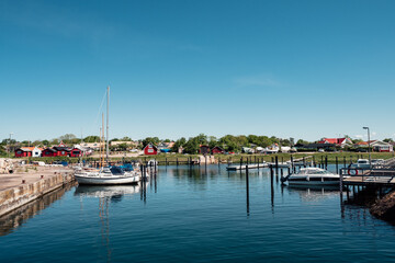 Fototapeta na wymiar Rammsjostrands harbour on the Swedish West Coast is a popular tourist destination during summer season.