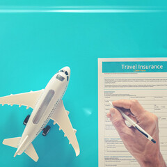 Closeup of man signing document for protection passengers traveling by plane