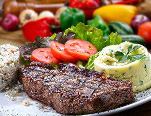 Grilled Steak with Salad and Mashed Potatoes