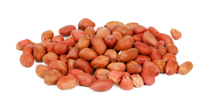 Dried peanuts on a white background, a bunch of nuts.