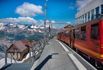  Red train to Jungfraojoch at Eiger Glacier station. (Top station of new Eiger Express,...