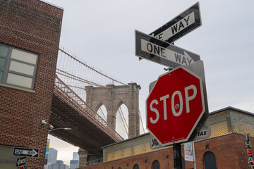 Brooklyn bridge in New York, road sign in NY, Red stop sign, One way sign in New York, Brooklyn...