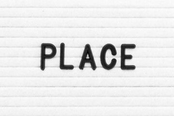 Black color letter in word place on white felt board background